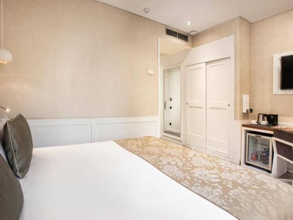 Catalonia Puerta del Sol : photo 6 de la chambre chambre double ou lits jumeaux - vue sur rue