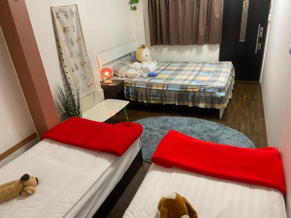 Yoshidoku Inn - Domome : photo 9 de la chambre chambre familiale avec salle de bains commune