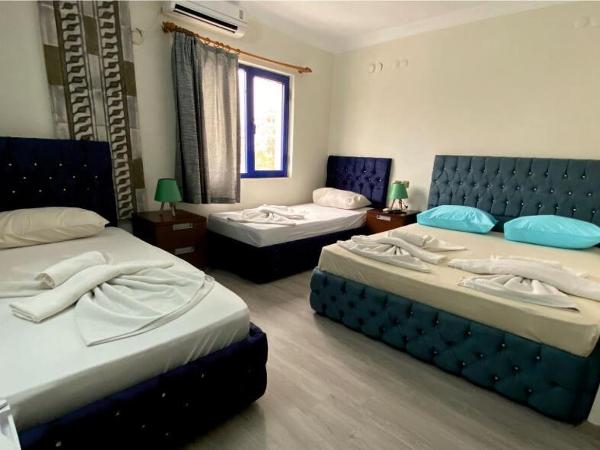 Ramos Hotel Kuşadası : photo 1 de la chambre chambre triple