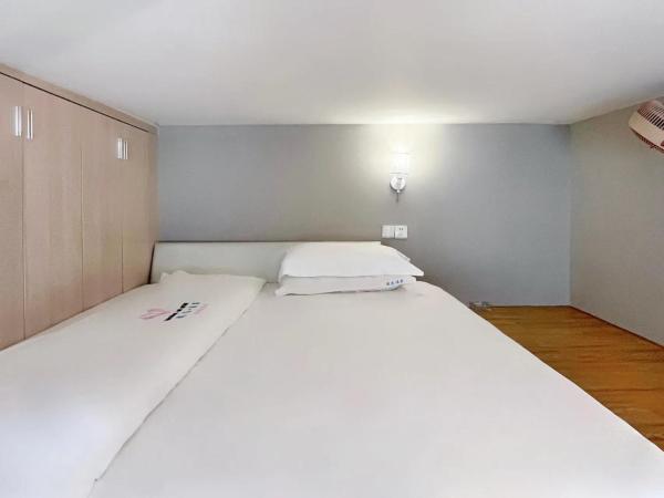 广州沃家国际公寓 : photo 10 de la chambre studio duplex