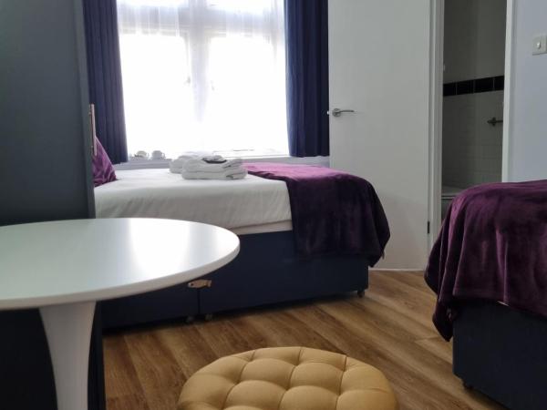 The Windmill Hotel : photo 1 de la chambre chambre familiale