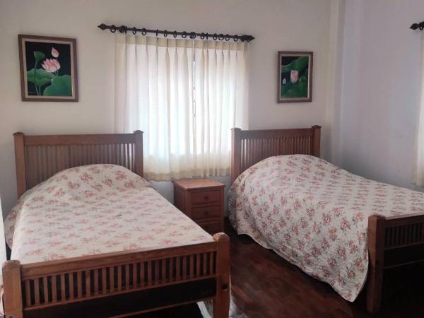 Chiang Mai Homey : photo 5 de la chambre chambre lits jumeaux avec salle de bains commune