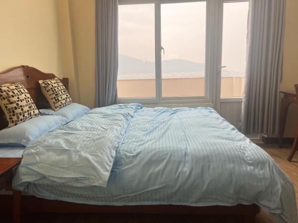 The Sparkling Turtle Backpackers Hostel : photo 1 de la chambre chambre lit king-size avec balcon