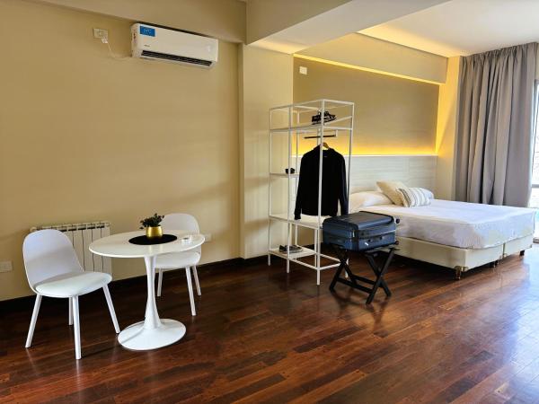 Roomie Salta by DOT Suites : photo 2 de la chambre chambre triple