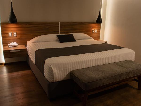 Estanza Hotel & Suites : photo 2 de la chambre suite junior