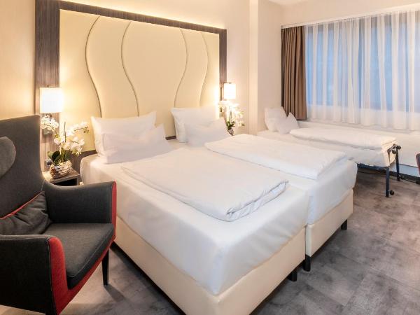 Best Western Plaza Hotel Mannheim : photo 4 de la chambre deluxe quadruple room with one double and two single beds