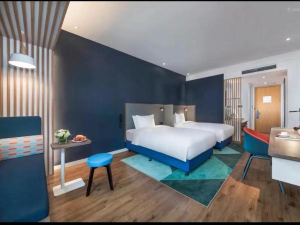 Holiday Inn Express Qingdao Chengyang Central, an IHG Hotel : photo 1 de la chambre chambre lits jumeaux supérieure