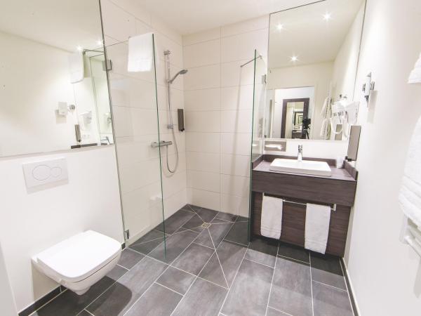 Best Western Plaza Hotel Mannheim : photo 5 de la chambre deluxe quadruple room with one double and two single beds