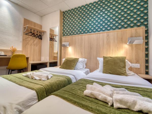 Hôtel Escurial - Centre Gare : photo 2 de la chambre chambre lits jumeaux