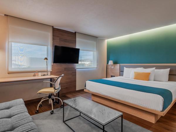 City Express Suites by Marriott Queretaro : photo 4 de la chambre chambre lit queen-size