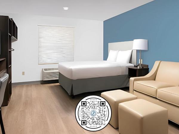Woodspring Suites Orlando International Drive : photo 6 de la chambre chambre lit king-size - accessible aux personnes à mobilité réduite/non-fumeurs