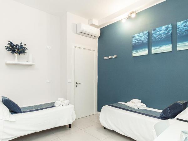 VittorioVeneto126 : photo 2 de la chambre chambre lits jumeaux avec douche 