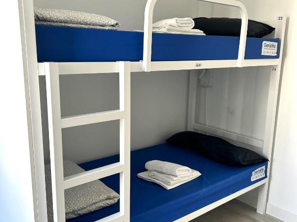 Albergue SCQ : photo 3 de la chambre lit dans dortoir mixte de 4 lits