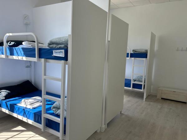 Albergue SCQ : photo 3 de la chambre lit dans dortoir mixte de 8 lits