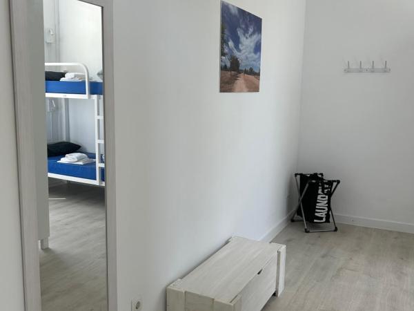 Albergue SCQ : photo 2 de la chambre lit dans dortoir mixte de 8 lits