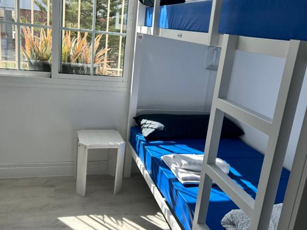 Albergue SCQ : photo 7 de la chambre lit dans dortoir mixte de 8 lits