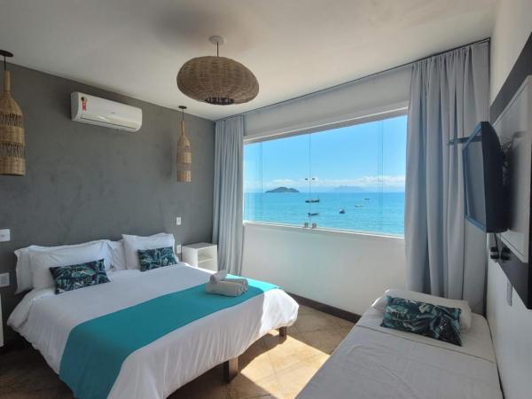 Bamboo Búzios Hostel : photo 1 de la chambre chambre triple supérieure - vue sur mer