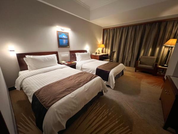 Baolong Hotel Shanghai : photo 2 de la chambre chambre lits jumeaux supérieure