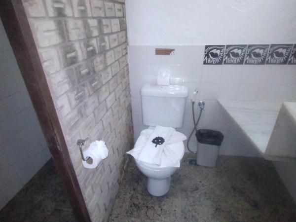 Laranjeiras Hostel : photo 2 de la chambre chambre triple avec salle de bains privative