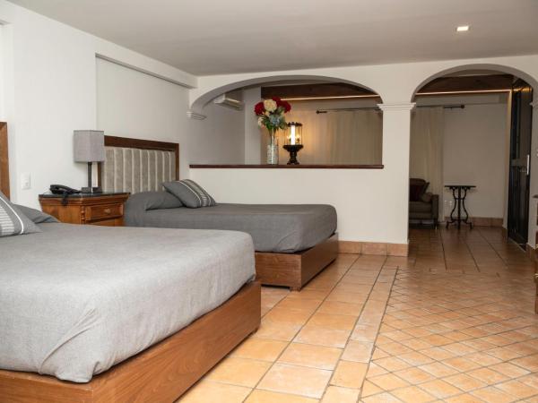 Hotel Boutique Naura Centro : photo 6 de la chambre suite familiale