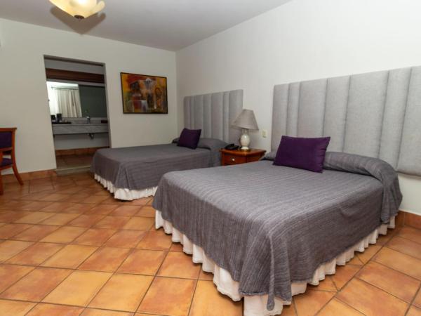 Hotel Boutique Naura Centro : photo 8 de la chambre suite junior avec 2 lits doubles