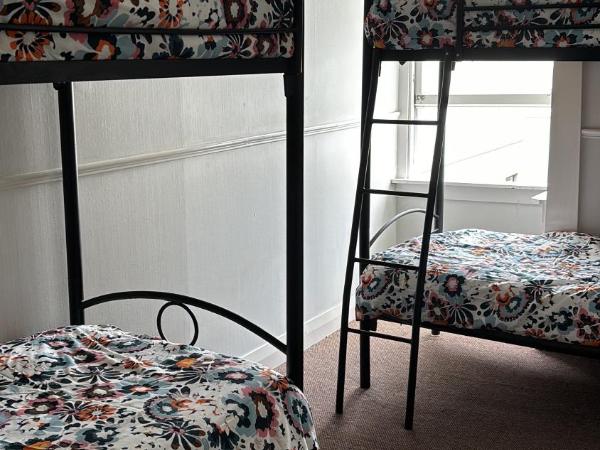 Worldwide Backpackers : photo 1 de la chambre lit dans un dortoir de 4 lits