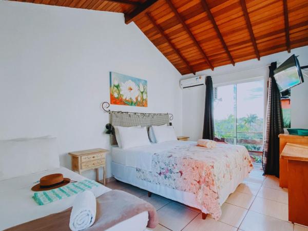 Calador Búzios Hotel : photo 1 de la chambre chambre supérieure