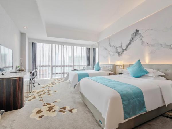 Huaqiang Plaza Hotel Shenzhen, Enjoy Complimentary Afternoon Tea & Mini Bar & Night Snack : photo 1 de la chambre chambre lits jumeaux deluxe