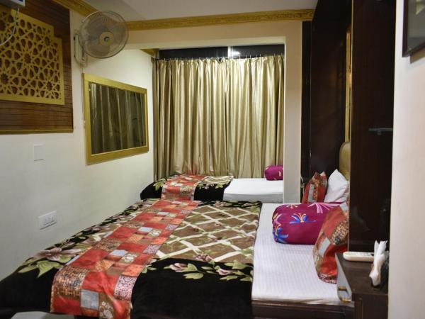 Ya Inn & Suites : photo 7 de la chambre chambre quadruple