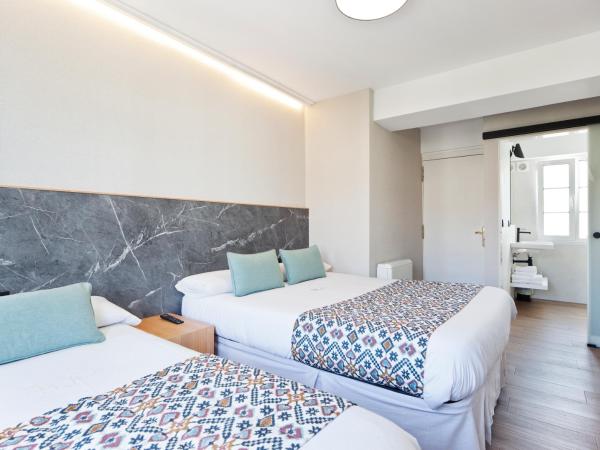 PR 25 de Julio : photo 10 de la chambre chambre double avec lit d'appoint