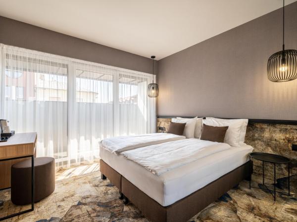 URBAN HOTEL : photo 1 de la chambre chambre double avec patio