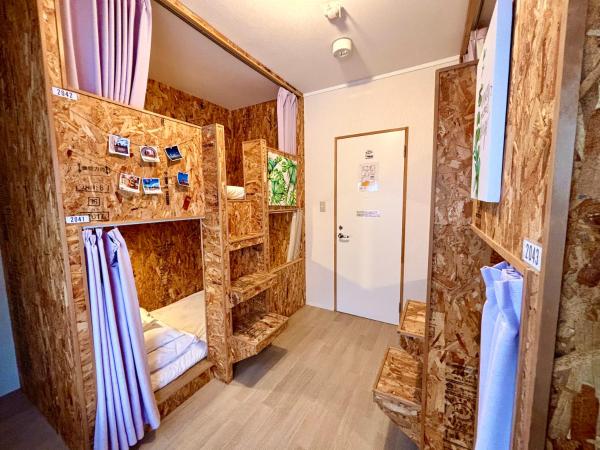 Guesthouse KOBE YAMATOMUSUBI : photo 1 de la chambre lit dans dortoir pour femmes de 4 lits