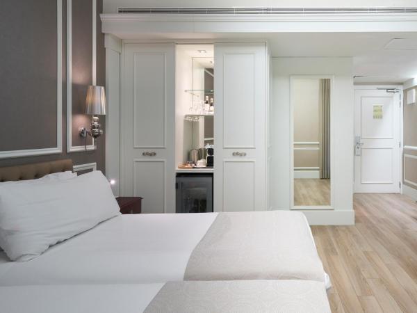 Catalonia Passeig de Gràcia 4* Sup : photo 3 de la chambre chambre familiale (2 adultes et 2 enfants)