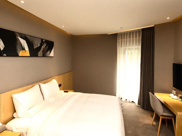 Chengdu PODI Hotel : photo 3 de la chambre chambre familiale deluxe