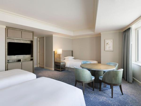 Nagoya Marriott Associa Hotel : photo 2 de la chambre family room with three twin beds and partial city view