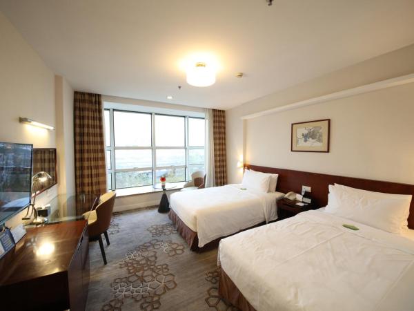 Liuhua Hotel : photo 2 de la chambre chambre lits jumeaux standard