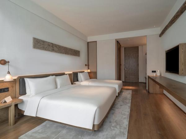 Sahe Hotel Shanghai World Expo : photo 1 de la chambre chambre familiale