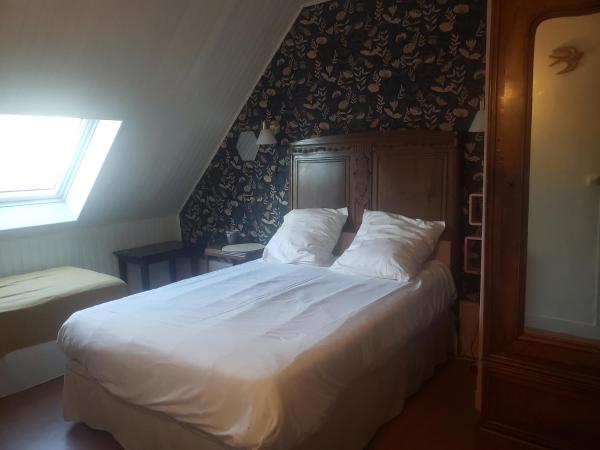 Chambres d'hôtes - gîte d'étape Avel Glaz : photo 3 de la chambre chambre quadruple avec salle de bains commune