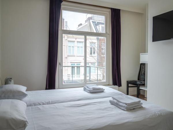 Hotel Kap City Centre : photo 3 de la chambre chambre lits jumeaux standard avec salle de bains privative