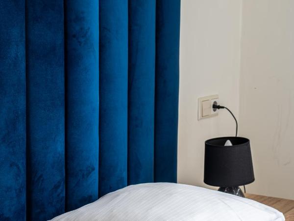 Hotel Kap City Centre : photo 5 de la chambre chambre lits jumeaux standard avec salle de bains privative