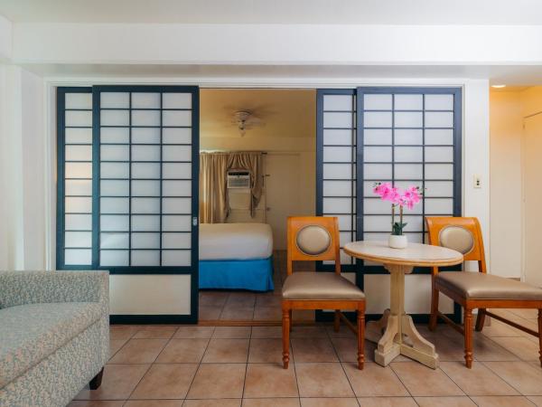 Waikiki Heritage Hotel : photo 1 de la chambre suite 1 chambre lit king-size avec canapé-lit