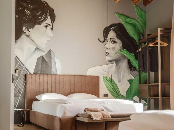 AR Suites&Art : photo 1 de la chambre chambre quadruple