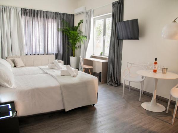 Celia Residence : photo 6 de la chambre chambre deluxe