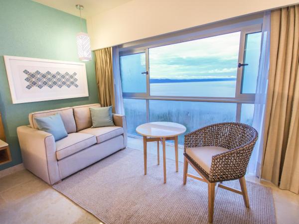 Sheraton Buganvilias Resort & Convention Center : photo 4 de la chambre grande chambre deluxe avec 1 lit king-size - vue sur baie - Étage supérieur