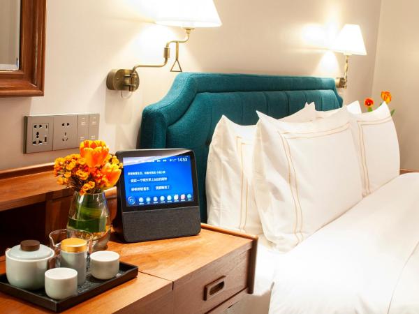 Royal Grace Hotel Optics Valley Wuhan : photo 2 de la chambre chambre lit queen-size - vue sur jardin