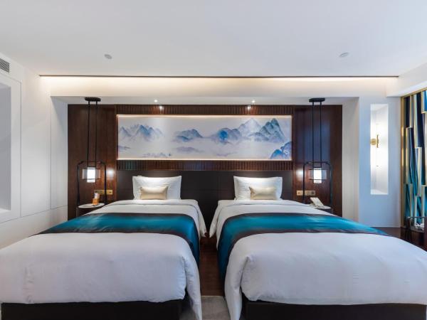 New Century Hotel Qianchao Hangzhou : photo 2 de la chambre chambre lits jumeaux deluxe