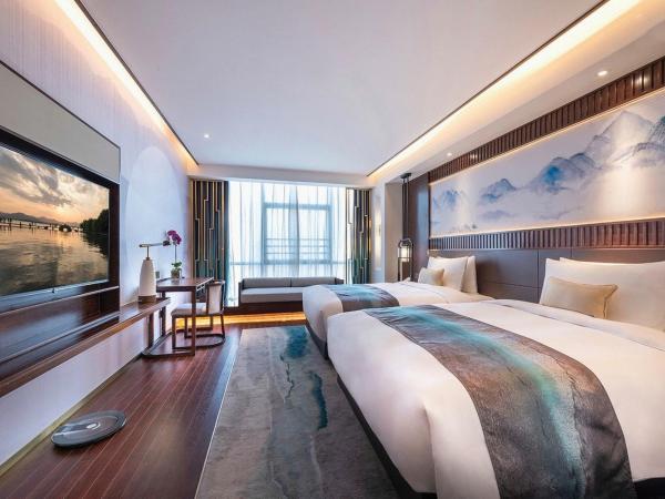 New Century Hotel Qianchao Hangzhou : photo 2 de la chambre chambre lits jumeaux premium