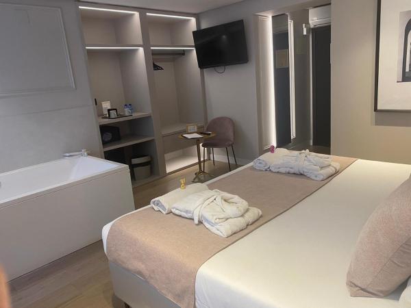 YOU & CO. J. Botánico Boutique : photo 5 de la chambre chambre double de luxe avec baignoire spa 