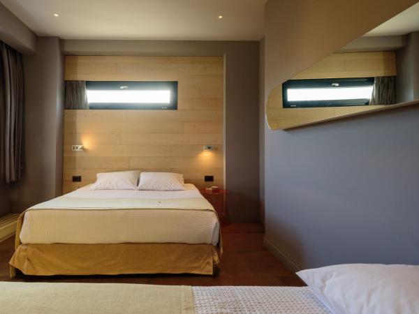 Essence Hotel : photo 5 de la chambre elegant triple room with city view