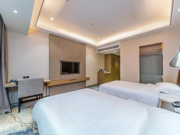 Guangzhou Nansha Meihao Lizhi Hotel : photo 1 de la chambre chambre lits jumeaux deluxe